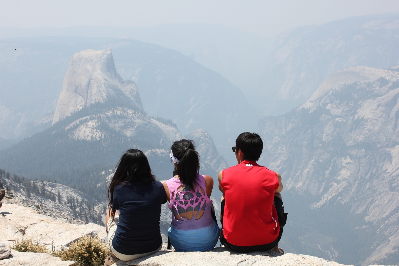 on Clouds Rest (3024 meters) with Half Dome (2694 meters) in the background